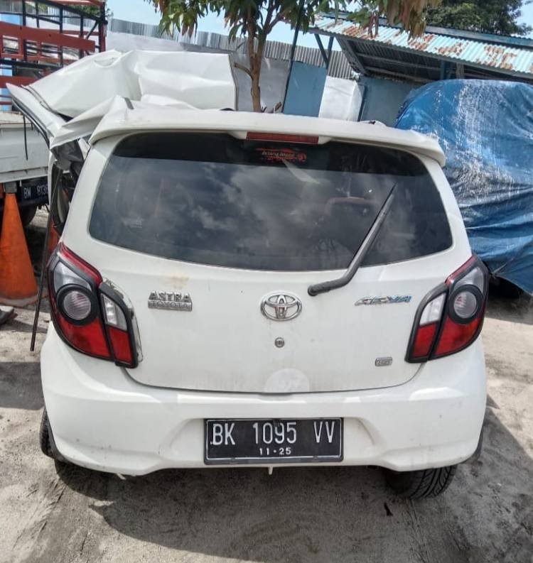 Seruduk Truk Trailer di Tol Perbaungan, Penumpang Agya Tewas, Pengemudi Luka-luka