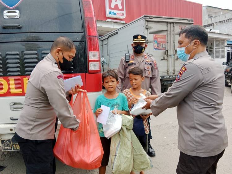 Polres  Belawan Santuni Warga Kurang Mampu di Hamparan Perak