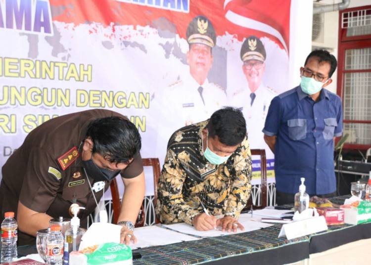 Pemkab dan Kejari Simalungun Teken MoU Penanganan Hukum Perdata dan Tata Usaha Negara