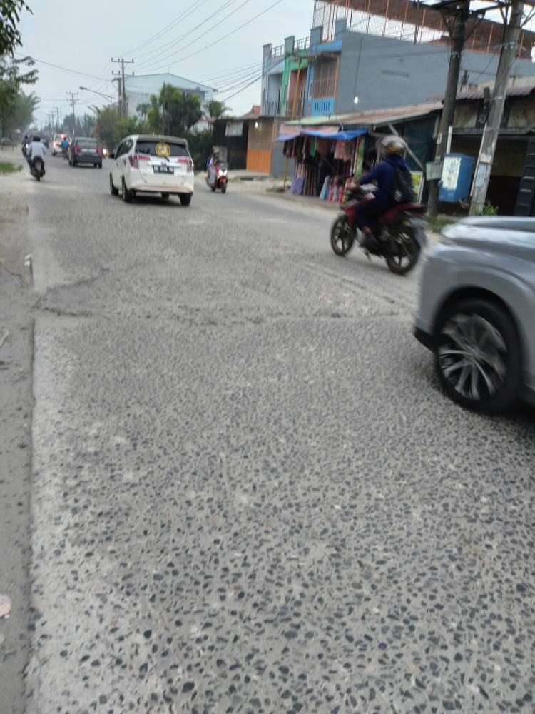 Jalan Kapten Rahmad Buddin Marelan “Kupak-kapik”