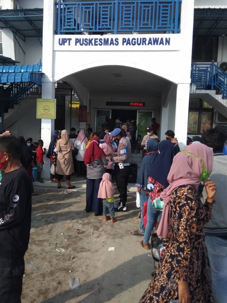 KPM PKH Cair Sambil Divaksin di UPT Puskesmas Pagurawan Batubara