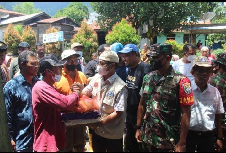 Wabup Agara Beri Bantuan Korban Banjir