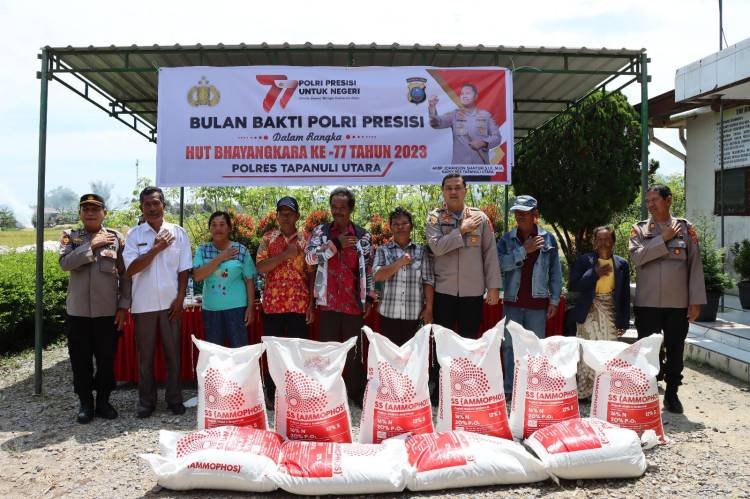 Polres Taput Berbagi Kasih Lewat Bhakti Sosial Menyambut HUT Bhayangkara ke-77