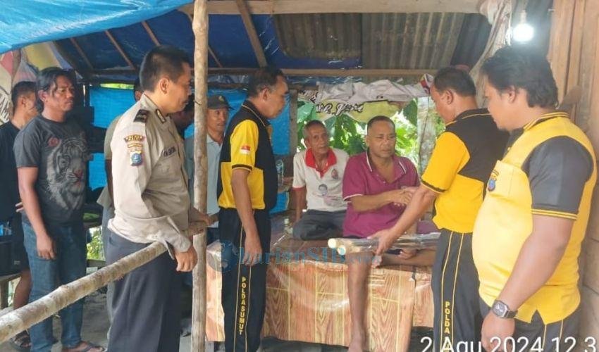 Kapolsek Tanah Pinem Berikan Bantuan kepada Warga yang Menderita Penyakit Menahun