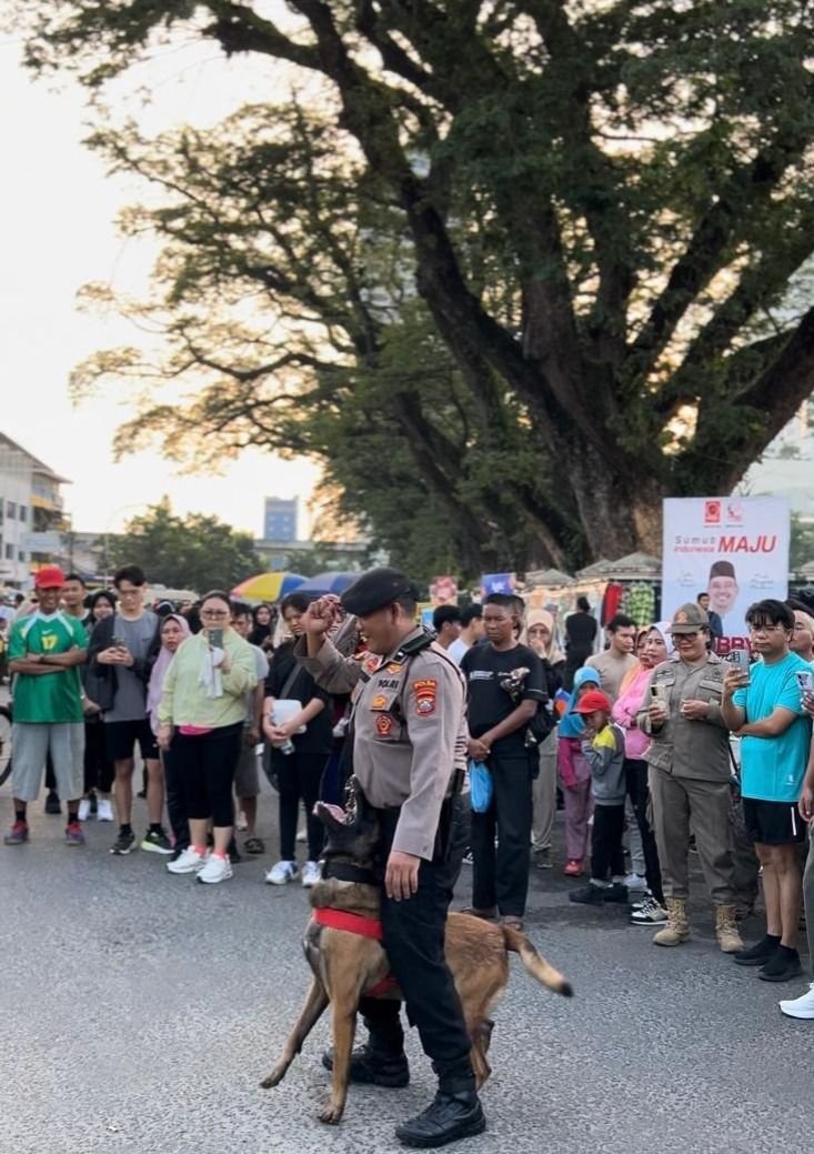 Cooling System Pilkada Damai dan Sukseskan PON 2024, Polda Sumut Hibur Warga di Acara Car Free Day