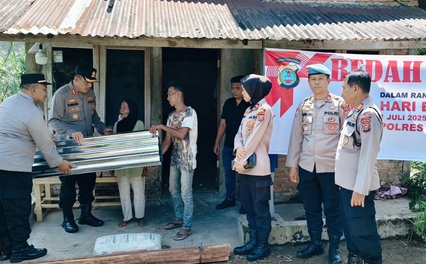 HUT Bhayangkara ke-79  Polres Binjai Salurkan Bantuan Kursi Roda dan Bedah Rumah